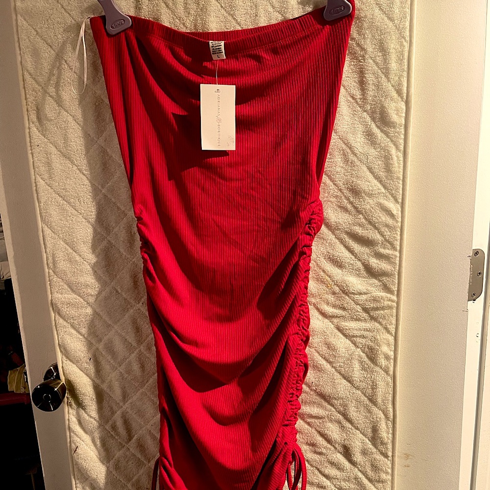 Red strapless dress that can adjust from the sides!